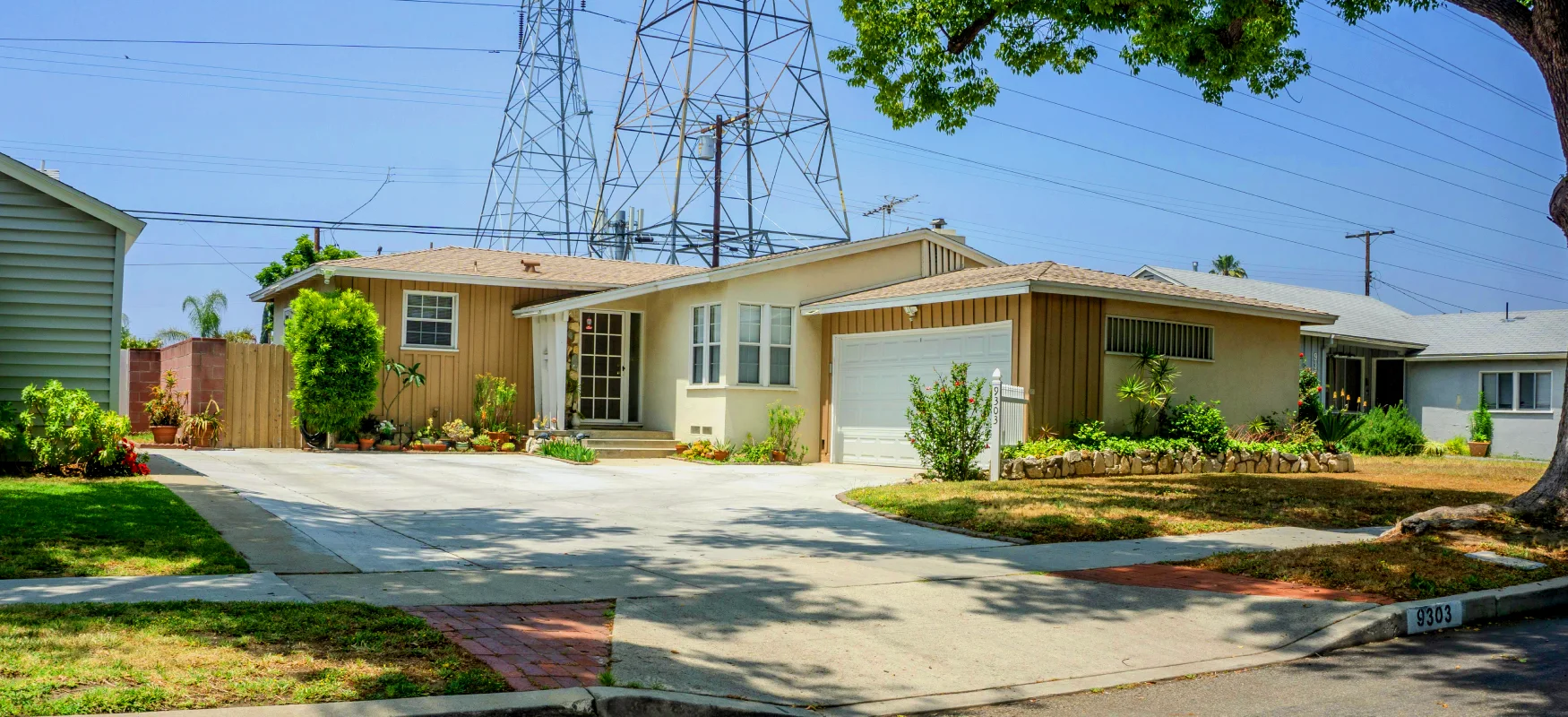 House Near Power Lines Photo