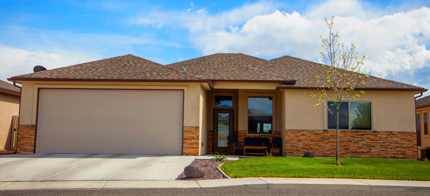 House With Stacked Stone And Tan Stucco Photo