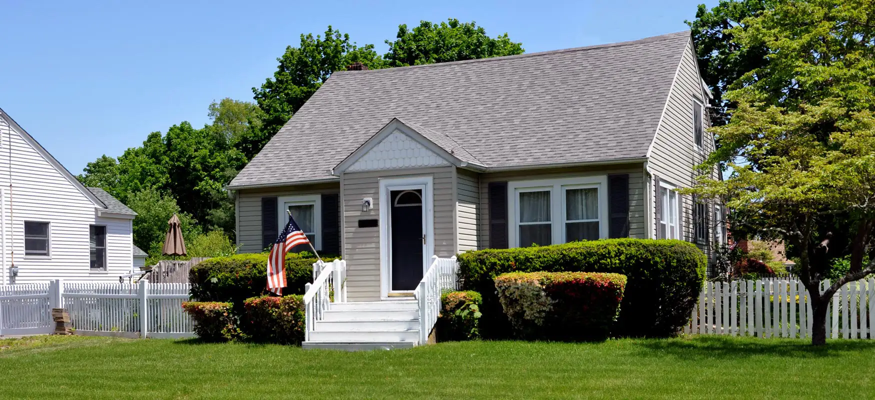 Tan House With Scalloped Siding Photo